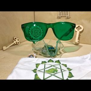 Rainbow Optx Accessories - Green lenses and translucent framed sunglasses Rainbow Optx Accessories - Green lenses and translucent framed sunglasses